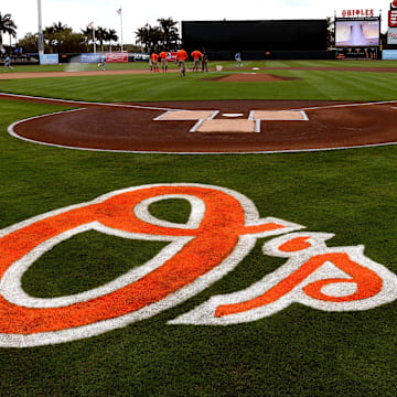 Feb 23, 2018; Sarasota, FL, USA; View of the Baltimore Orioles logo on the field before the start of the spring training game against the Tampa Bay Rays at Ed Smith Stadium. Mandatory Credit: Jonathan Dyer-Imagn Images