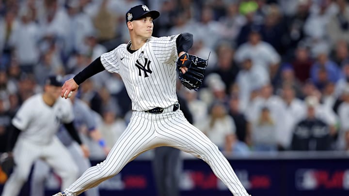 Oct 30, 2024; New York, New York, USA; New York Yankees pitcher Luke Weaver (30) pitches during the eighth inning against the Los Angeles Dodgers in game four of the 2024 MLB World Series at Yankee Stadium. Oct 30, 2024; New York, New York, USA; New York Yankees pitcher Luke Weaver (30) pitches during the eighth inning against the Los Angeles Dodgers in game four of the 2024 MLB World Series at Yankee Stadium.
