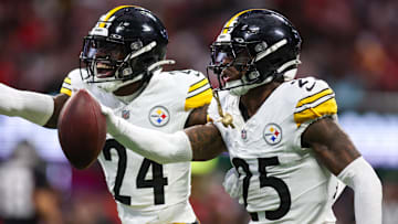 Sep 8, 2024; Atlanta, Georgia, USA; Pittsburgh Steelers safety DeShon Elliott (25) celebrates with cornerback Joey Porter Jr. (24) after an interception against the Atlanta Falcons in the first quarter at Mercedes-Benz Stadium. Mandatory Credit: Brett Davis-Imagn Images