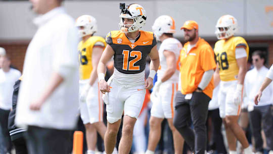 Tennessee quarterback Jake Merklinger (12) warms up before the Orange & White spring game, Saturday, April 12, 2025.