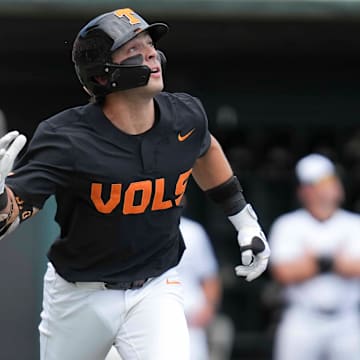 Tennessee infielder Andrew Fischer (11) flips his bat after he hits a home run during a NCAA baseball game between the Tennessee Volunteers and Vanderbilt Commodores at Lindsey Nelson Stadium on May 11, 2025.