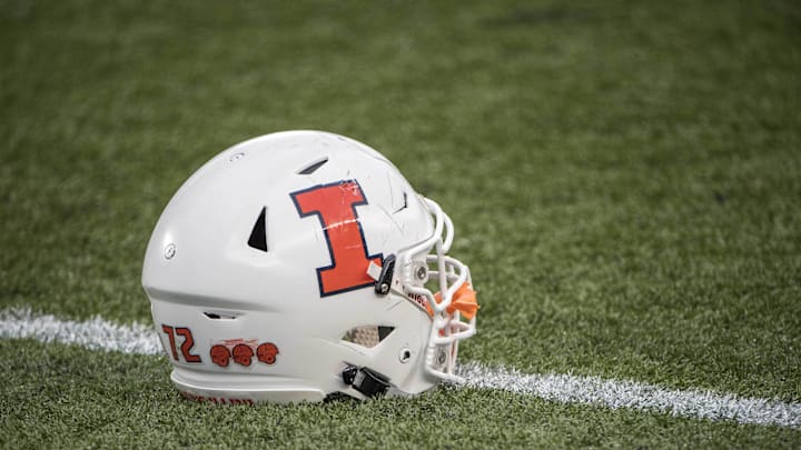 Oct 21, 2017; Minneapolis, MN, USA; A Illinois Fighting Illini helmet sits on the grass during pre