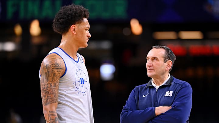 Apr 1, 2022; New Orleans, LA, USA; Duke Blue Devils head coach Mike Krzyzewski talks to forward Paolo Banchero (5) during a practice session before the 2022 NCAA men's basketball tournament Final Four semifinals at Caesars Superdome.
