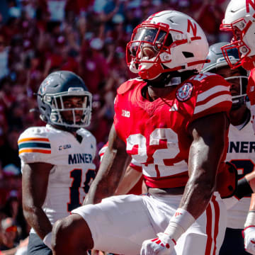 Aug 31, 2024; Lincoln, Nebraska, USA; Nebraska Cornhuskers running back Gabe Ervin Jr. (22) celebrates after scoring a touchdown against the UTEP Miners during the second quarter at Memorial Stadium.