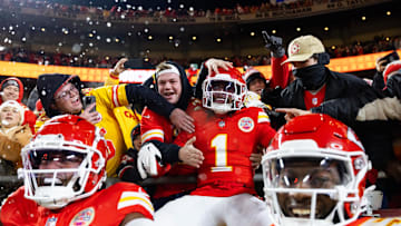 Jan 26, 2025; Kansas City, MO, USA; Kansas City Chiefs wide receiver Xavier Worthy (1) celebrate with fans after a touchdown against the Buffalo Bills during the first half in the AFC Championship game at GEHA Field at Arrowhead Stadium. Mandatory Credit: Mark J. Rebilas-Imagn Images
