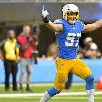 Sep 8, 2024; Inglewood, California, USA;  Los Angeles Chargers linebacker Joey Bosa (97) celebrates after forcing a fumble in the second half against the Las Vegas Raiders at SoFi Stadium. Mandatory Credit: Jayne Kamin-Oncea-Imagn Images