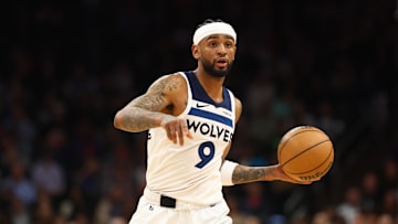 Jan 29, 2025; Phoenix, Arizona, USA; Minnesota Timberwolves guard Nickeil Alexander-Walker (9) against the Phoenix Suns at Footprint Center. Mandatory Credit: Mark J. Rebilas-Imagn Images