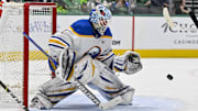 Apr 9, 2024; Dallas, Texas, USA; Buffalo Sabres goaltender Ukko-Pekka Luukkonen (1) makes a glove save against the Dallas Stars during the second period at the American Airlines Center. Mandatory Credit: Jerome Miron-Imagn Images