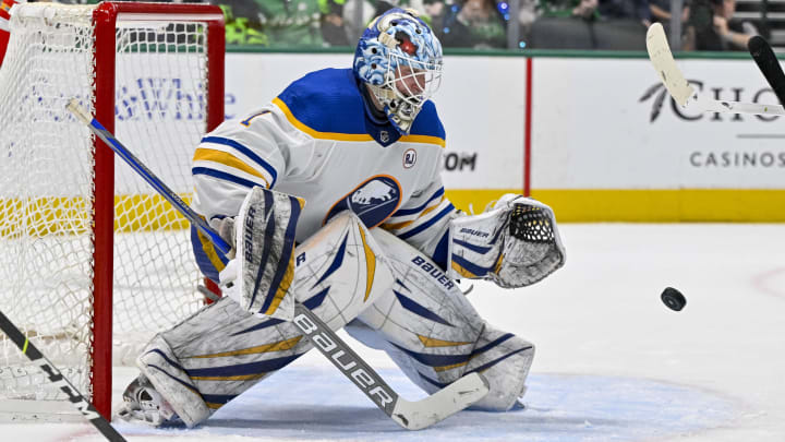 Apr 9, 2024; Dallas, Texas, USA; Buffalo Sabres goaltender Ukko-Pekka Luukkonen (1) makes a glove save against the Dallas Stars during the second period at the American Airlines Center. Mandatory Credit: Jerome Miron-USA TODAY Sports