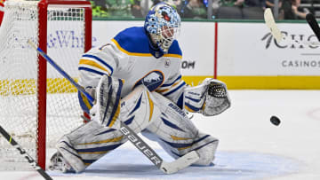 Apr 9, 2024; Dallas, Texas, USA; Buffalo Sabres goaltender Ukko-Pekka Luukkonen (1) makes a glove save against the Dallas Stars during the second period at the American Airlines Center. Mandatory Credit: Jerome Miron-USA TODAY Sports