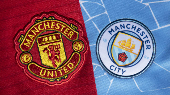 The Manchester United and Manchester City Badges