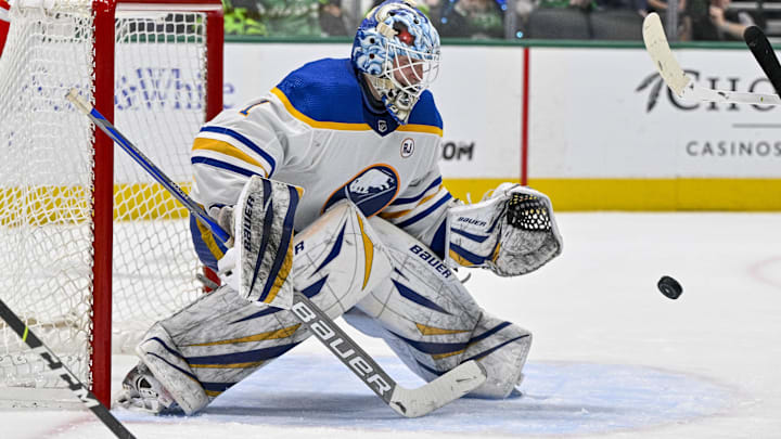 Apr 9, 2024; Dallas, Texas, USA; Buffalo Sabres goaltender Ukko-Pekka Luukkonen (1) makes a glove save against the Dallas Stars during the second period at the American Airlines Center. Mandatory Credit: Jerome Miron-Imagn Images