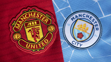 The Manchester United and Manchester City Badges
