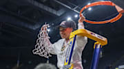 Mar 30, 2025; Birmingham, AL, USA; South Carolina Gamecocks head coach Dawn Staley cuts the net after the South Carolina Gamecocks win over the Duke Blue Devils at an Elite 8 NCAA Tournament basketball game at Legacy Arena.