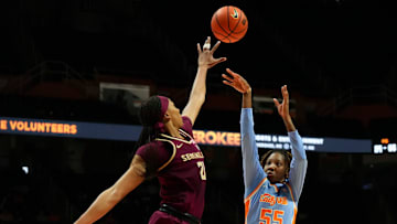 Florida State forward Makayla Timpson (21) tries to block Tennessee guard Talaysia Cooper (55) shot during a college basketball game at Thompson-Boling Arena at Food City Center in Knoxville, Tenn., on Wednesday, Dec. 4, 2024.