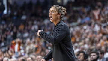 Mar 29, 2025; Birmingham, AL, USA; Tennessee Lady Vols head coach Kim Caldwell works with her team during the first half of a Sweet 16 NCAA Tournament basketball game against the Texas Longhorns at Legacy Arena. Mandatory Credit: Vasha Hunt-Imagn Images