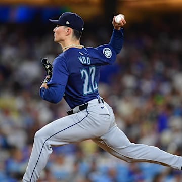 Seattle Mariners pitcher Bryan Woo (22) throws against the Los Angeles Dodgers during the sixth inning at Dodger Stadium on Aug 19.