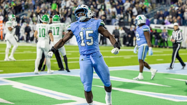 Dec 5, 2025; New Orleans, LA, USA;  Tulane Green Wave wide receiver Zycarl Lewis Jr. (15) reacts to a play against the North Texas Mean Green during the second half in the 2025 American Championship at Yulman Stadium. Mandatory Credit: Stephen Lew-Imagn Images