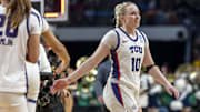 TCU Horned Frogs guard Hailey Van Lith celebrates with her teammates after the win over the Notre Dame Fighting Irish.