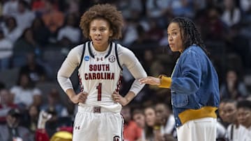 Mar 28, 2025; Birmingham, AL, USA; South Carolina Gamecocks head coach Dawn Staley works with guard Maddy McDaniel (1) during the first half of a Sweet 16 NCAA Tournament basketball game against the Maryland Terrapins at Legacy Arena. Mandatory Credit: Vasha Hunt-Imagn Images