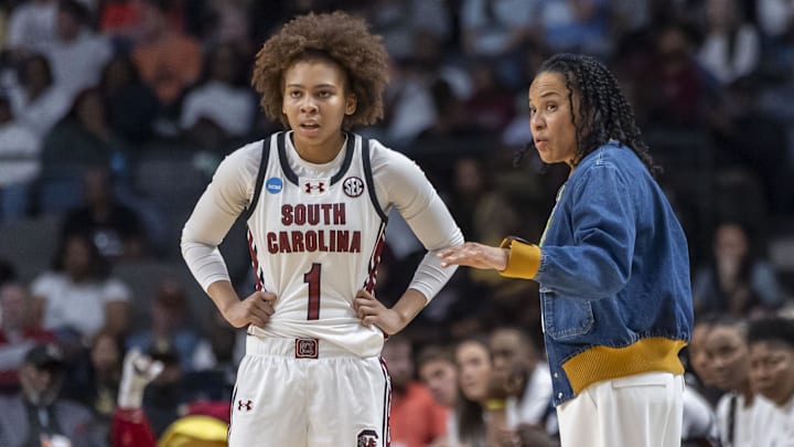 Mar 28, 2025; Birmingham, AL, USA; South Carolina Gamecocks head coach Dawn Staley works with guard Maddy McDaniel (1) during the first half of a Sweet 16 NCAA Tournament basketball game against the Maryland Terrapins at Legacy Arena. Mandatory Credit: Vasha Hunt-Imagn Images
