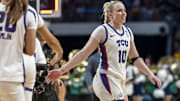 TCU Horned Frogs guard Hailey Van Lith celebrates with her teammates after the win over the Notre Dame Fighting Irish.