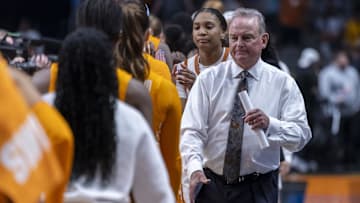 Mar 29, 2025; Birmingham, AL, USA; Texas Longhorns head coach Vic Schaefer shakes hands with Tennessee Lady Vols players after Texas won in a Sweet 16.