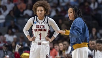 Mar 28, 2025; Birmingham, AL, USA; South Carolina Gamecocks head coach Dawn Staley works with guard Maddy McDaniel (1) during the first half of a Sweet 16 NCAA Tournament basketball game against the Maryland Terrapins at Legacy Arena. Mandatory Credit: Vasha Hunt-Imagn Images