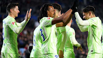 Jules Kounde (centre) has been targeted by Chelsea