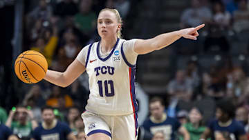 Mar 29, 2025; Birmingham, AL, USA; TCU Horned Frogs guard Hailey Van Lith (10) signals to her teammates during the second half of a Sweet 16 NCAA Tournament basketball game against the Notre Dame Fighting Irish at Legacy Arena. Mandatory Credit: Vasha Hunt-Imagn Images