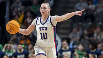 Mar 29, 2025; Birmingham, AL, USA; TCU Horned Frogs guard Hailey Van Lith (10) signals to her teammates during the second half of a Sweet 16 NCAA Tournament basketball game against the Notre Dame Fighting Irish at Legacy Arena. Mandatory Credit: Vasha Hunt-Imagn Images