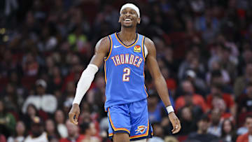 Dec 1, 2024; Houston, Texas, USA; Oklahoma City Thunder guard Shai Gilgeous-Alexander (2) reacts after scoring a basket during the first quarter against the Houston Rockets at Toyota Center. Mandatory Credit: Troy Taormina-Imagn Images