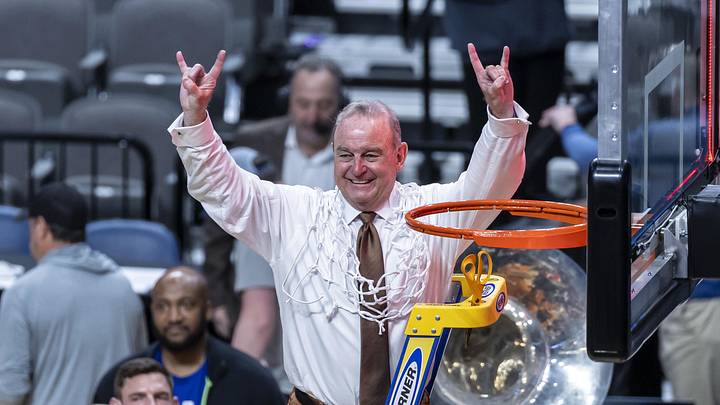 Mar 31, 2025; Birmingham, AL, USA; Texas Longhorns head coach Vic Schaefer waves to the fans after cutting the net following a win over the TCU Horned Frogs at an Elite 8 NCAA Tournament basketball game at Legacy Arena.
