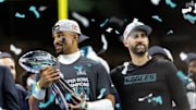 Philadelphia Eagles quarterback Jalen Hurts and head coach Nick Sirianni with the Vince Lombardi Trophy after Super Bowl LIX