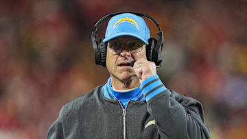 Dec 8, 2024; Kansas City, Missouri, USA; Los Angeles Chargers head coach Jim Harbaugh looks on during the first half against the Kansas City Chiefs at GEHA Field at Arrowhead Stadium. Mandatory Credit: Jay Biggerstaff-Imagn Images