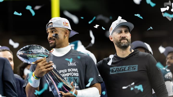 Philadelphia Eagles quarterback Jalen Hurts and head coach Nick Sirianni with the Vince Lombardi Trophy after Super Bowl LIX