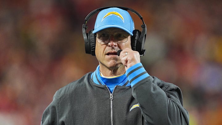 Dec 8, 2024; Kansas City, Missouri, USA; Los Angeles Chargers head coach Jim Harbaugh looks on during the first half against the Kansas City Chiefs at GEHA Field at Arrowhead Stadium. Mandatory Credit: Jay Biggerstaff-Imagn Images Dec 8, 2024; Kansas City, Missouri, USA; Los Angeles Chargers head coach Jim Harbaugh looks on during the first half against the Kansas City Chiefs at GEHA Field at Arrowhead Stadium. Mandatory Credit: Jay Biggerstaff-Imagn Images