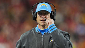 Dec 8, 2024; Kansas City, Missouri, USA; Los Angeles Chargers head coach Jim Harbaugh looks on during the first half against the Kansas City Chiefs at GEHA Field at Arrowhead Stadium. Mandatory Credit: Jay Biggerstaff-Imagn Images