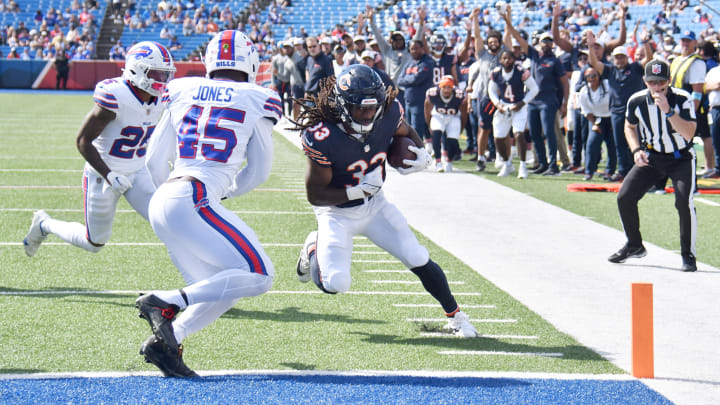 Aug 10, 2024; Orchard Park, New York, USA; Chicago Bears running back Ian Wheeler (33) beats Buffalo Bills linebacker Deion Jones (45) to the endzone to score a touchdown in the fourth quarter of a pre-season game at Highmark Stadium. 