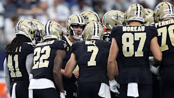 Sep 15, 2024; Arlington, Texas, USA; New Orleans Saints quarterback Derek Carr (4) calls a play against the Dallas Cowboys in the second quarter at AT&T Stadium. Mandatory Credit: Tim Heitman-Imagn Images