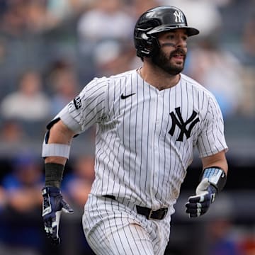 Jul 13, 2025; Bronx, New York, USA; New York Yankees catcher Austin Wells (28) runs out a single against the Chicago Cubs during the sixth inning at Yankee Stadium. Mandatory Credit: Gregory Fisher-Imagn Images