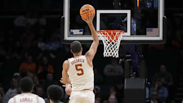Mar 21, 2024; Charlotte, NC, USA; Texas Longhorns forward Kadin Shedrick (5) shoots in the first round of the 2024 NCAA Tournament at Spectrum Center. Mandatory Credit: Bob Donnan-Imagn Images