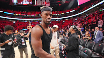 Jan 19, 2025; Miami, Florida, USA;  Miami Heat forward Jimmy Butler (22) walks off the court after greeting court-side friends following the victory over the San Antonio Spurs at Kaseya Center. Mandatory Credit: Jim Rassol-Imagn Images