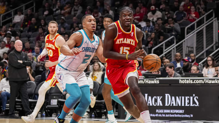 Apr 10, 2024; Atlanta, Georgia, USA; Atlanta Hawks center Clint Capela (15) drives past Charlotte