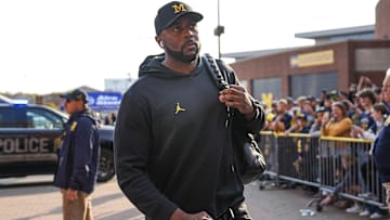 Michigan head coach Sherrone Moore arrives ahead of the Washington game at Michigan Stadium in Ann Arbor on Saturday, Oct. 18, 2025.