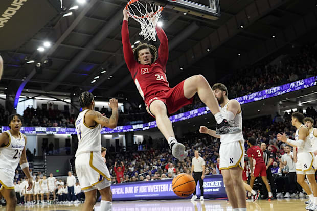 Nebraska Cornhuskers center Braxton Meah (34) dunks the ball on Northwestern Wildcats guard K.J. Windham (24).
