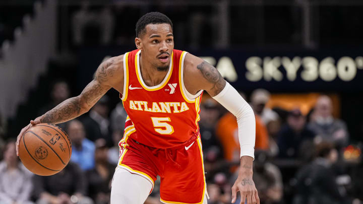 Mar 10, 2024; Atlanta, Georgia, USA; Atlanta Hawks guard Dejounte Murray (5) controls the ball against the New Orleans Pelicans during the first half at State Farm Arena. Mandatory Credit: Dale Zanine-USA TODAY Sports
