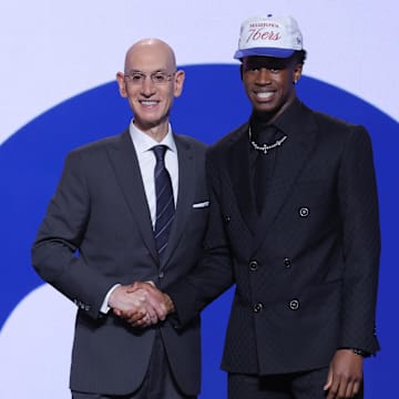 VJ Edgecombe stands with NBA commissioner Adam Silver after being selected by the Philadelphia 76ers in the 2025 NBA Draft