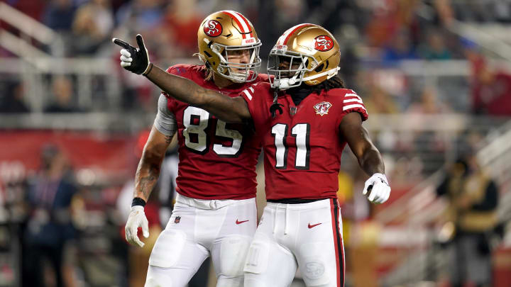 Nov 15, 2021; Santa Clara, California, USA; San Francisco 49ers wide receiver Brandon Aiyuk (11) celebrates next to tight end George Kittle (85) after making a catch for a first down against the Los Angeles Rams in the second quarter at Levi's Stadium. Mandatory Credit: Cary Edmondson-USA TODAY Sports