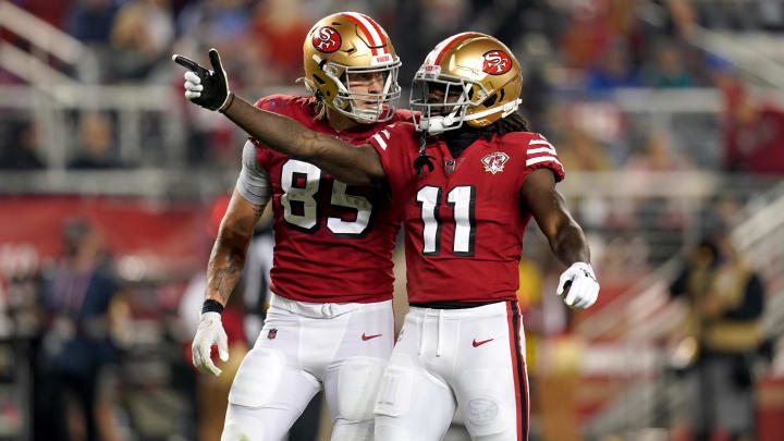 Nov 15, 2021; Santa Clara, California, USA; San Francisco 49ers wide receiver Brandon Aiyuk (11) celebrates next to tight end George Kittle (85) after making a catch for a first down against the Los Angeles Rams in the second quarter at Levi's Stadium. Mandatory Credit: Cary Edmondson-USA TODAY Sports